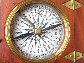 Close up view of compass dial & hand made hinges